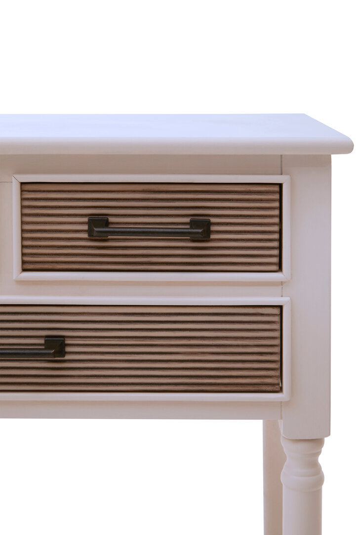 Compact white console table with three ribbed wood-effect drawers and lower shelf, isolated on white.