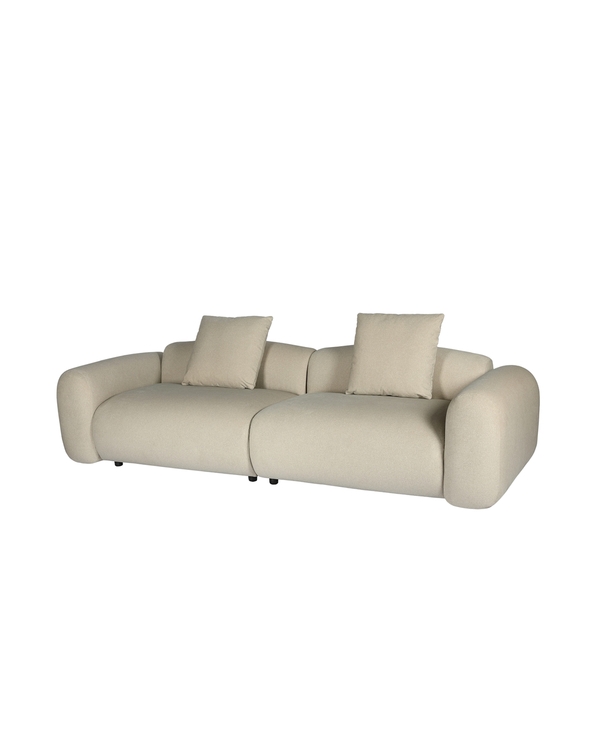 A modern curved sofa in a light beige fabric with two matching square throw pillows, shown against a plain white background.