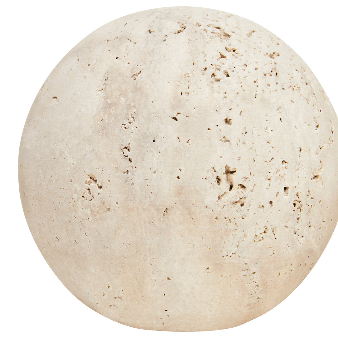 Round beige stone on a white background