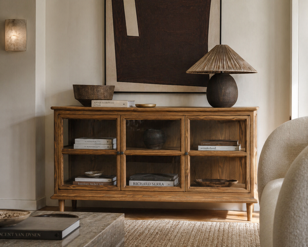 Wooden cabinet with glass doors in a living room setting