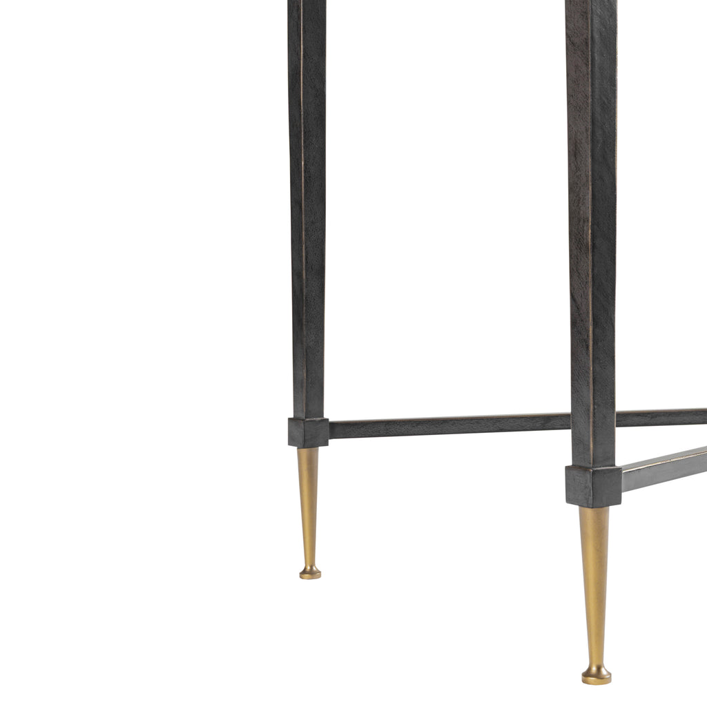 Metal frame with brass legs on a white background