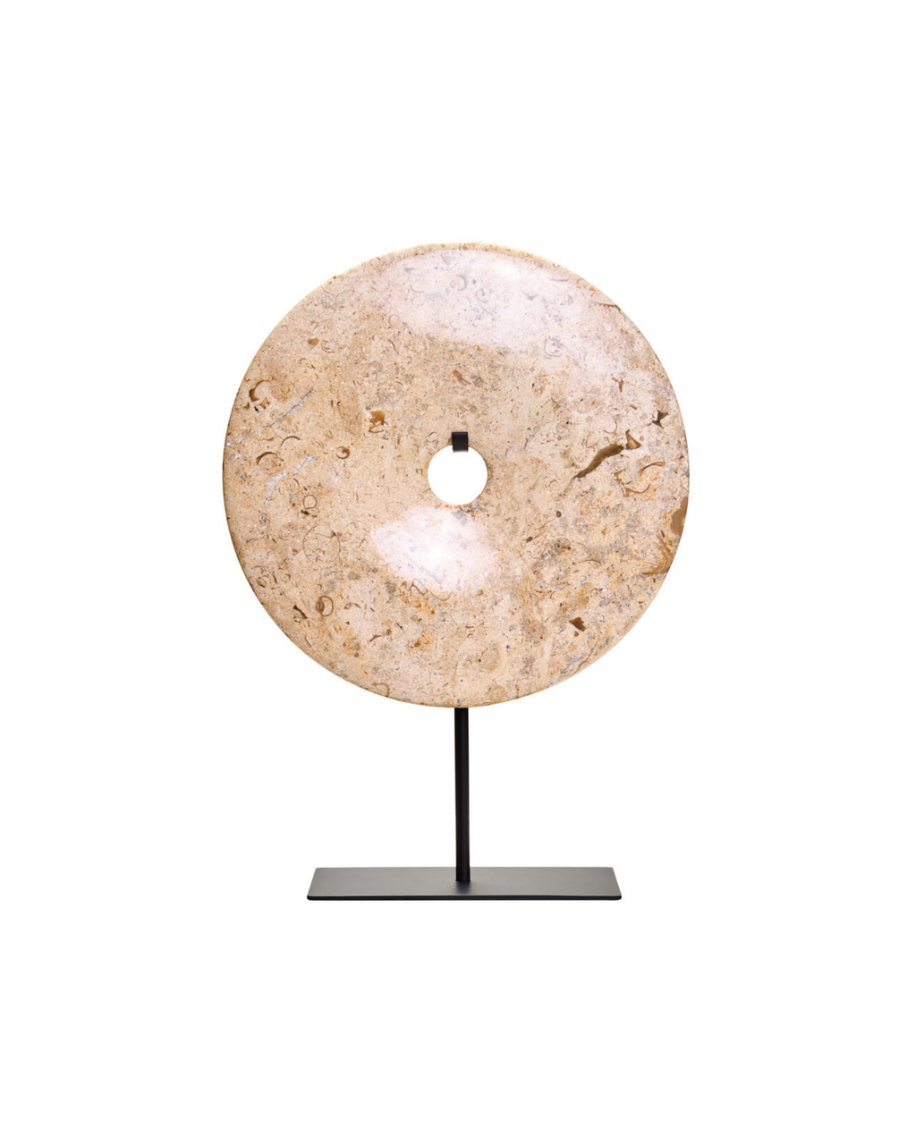 Decorative stone disc on a stand against a white background