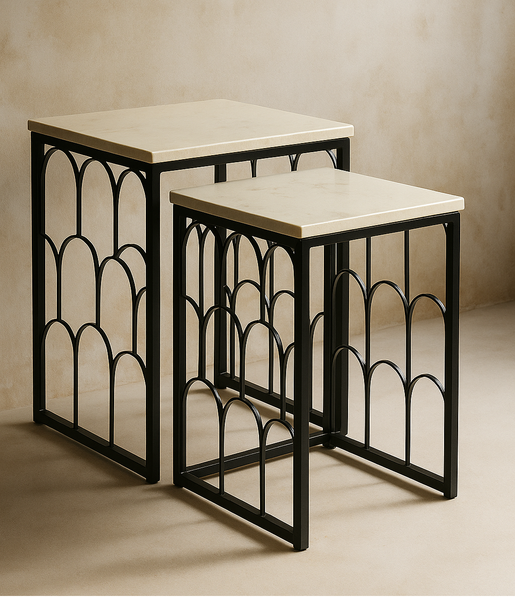 Set of two nesting tables with marble tops and black metal frames on a beige background