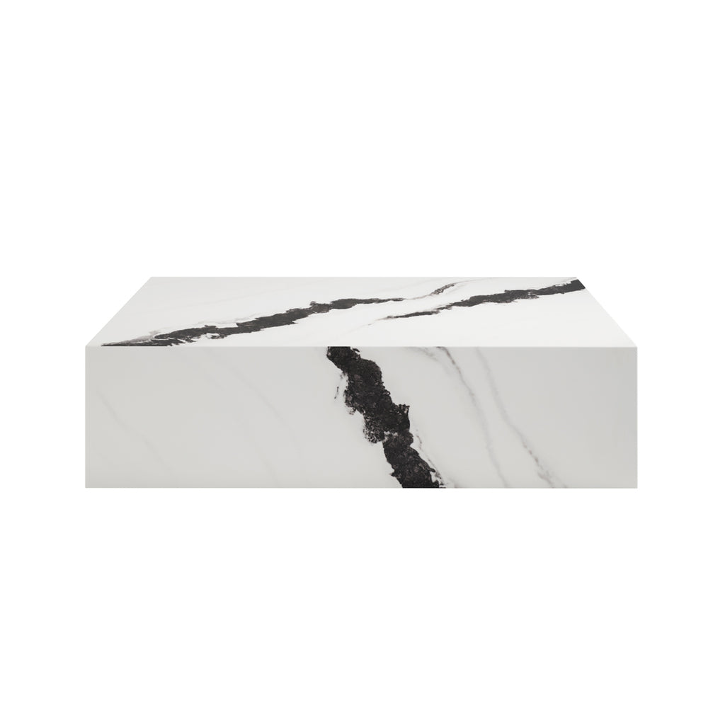 Marble-patterned surface with black veins on a white background