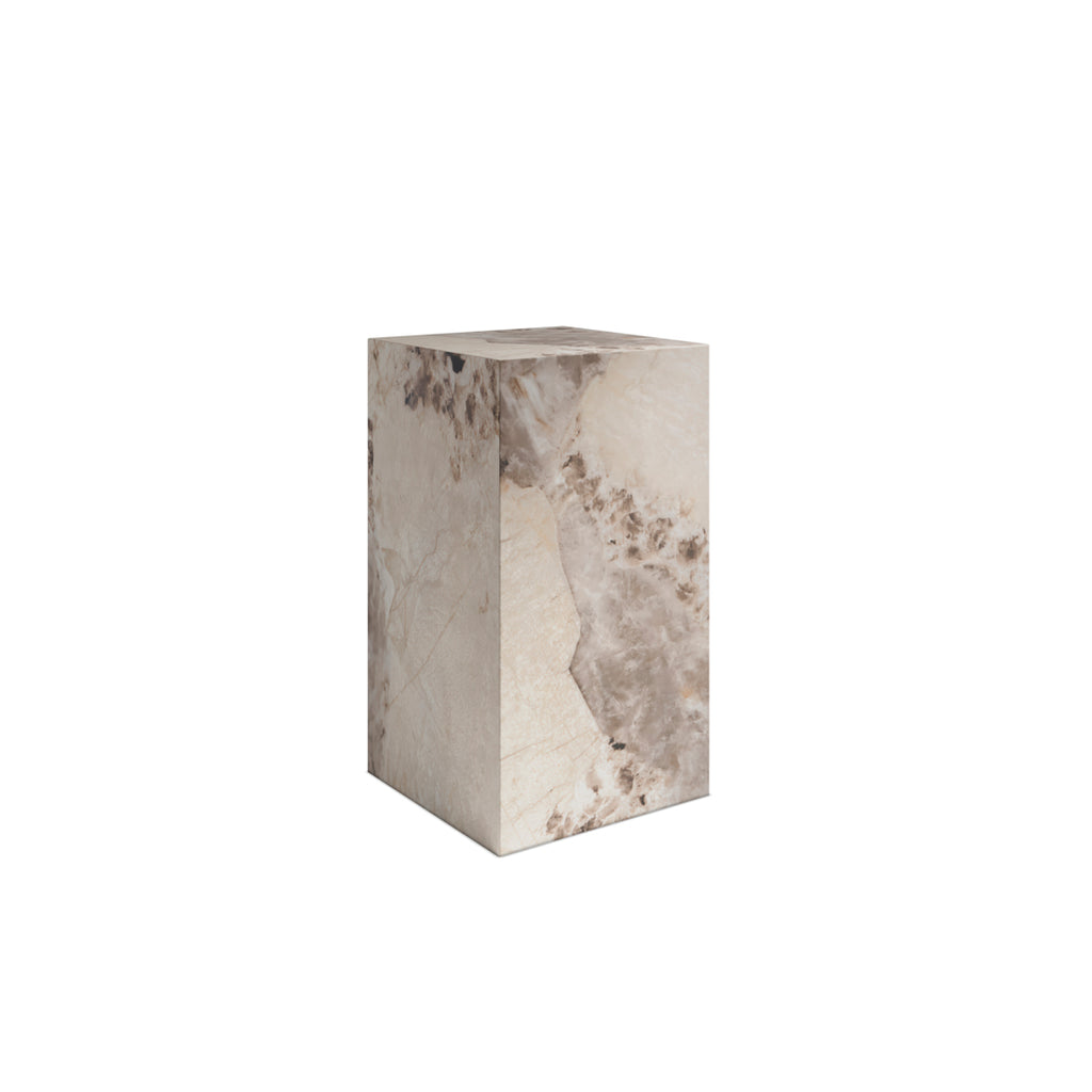 Square stone pedestal on a white background